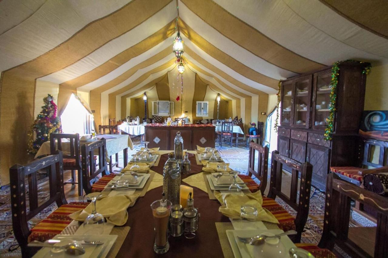 Sahara Majestic Luxury Camp Hotel Merzuga Kültér fotó The interior of a tent at the resort